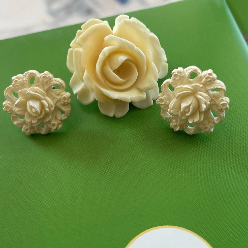Carved rose brooch and earring set. Made in Germany.